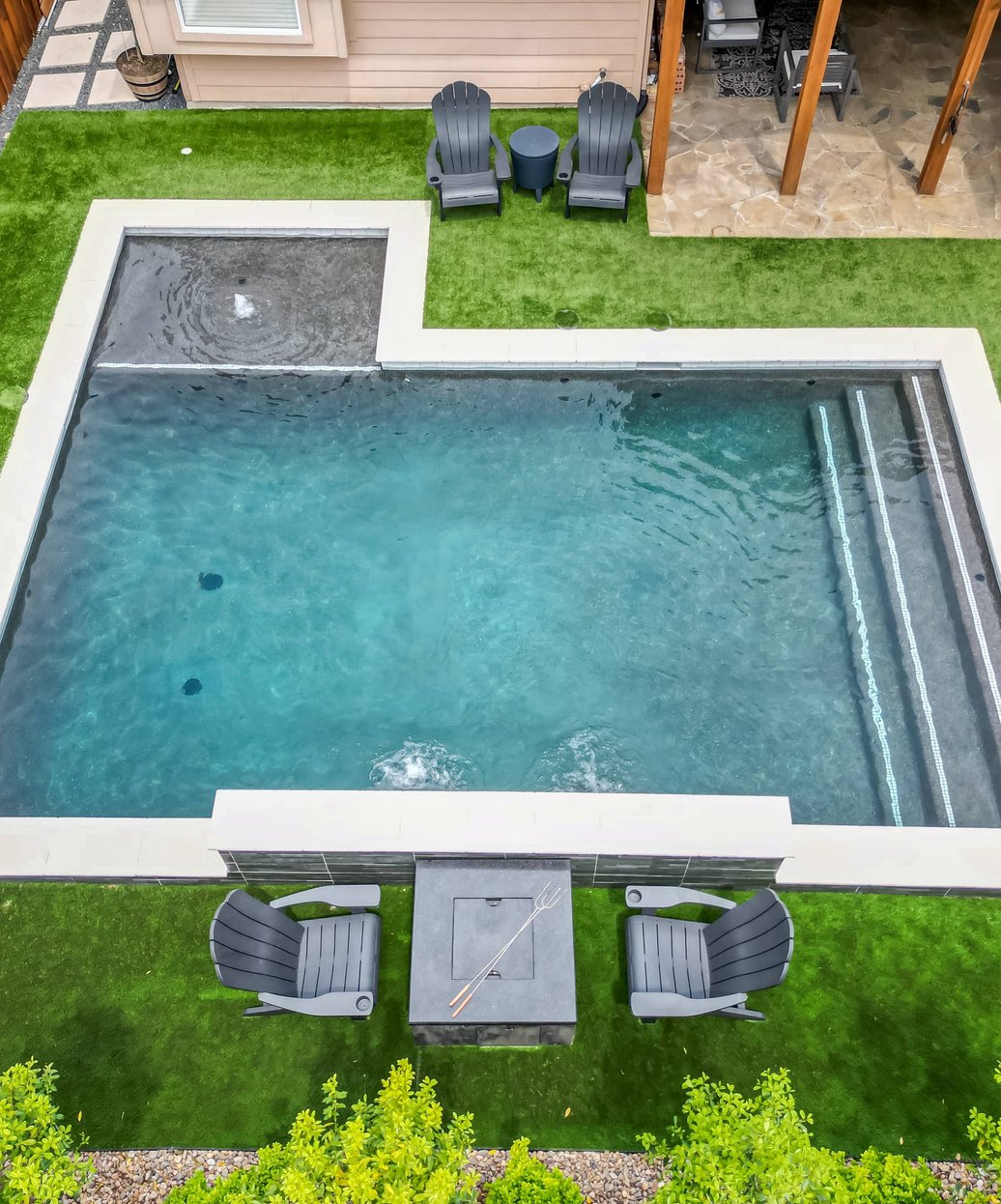 New gunite pool completed by TidalWave Custom Pools in Frisco, TX