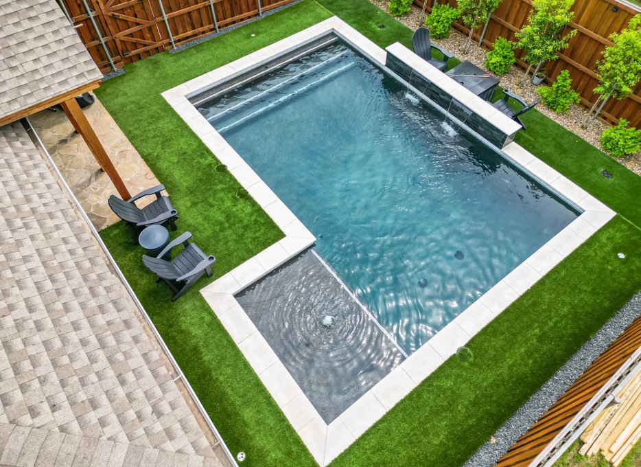 Aerial view of modern rectangular pool and spa