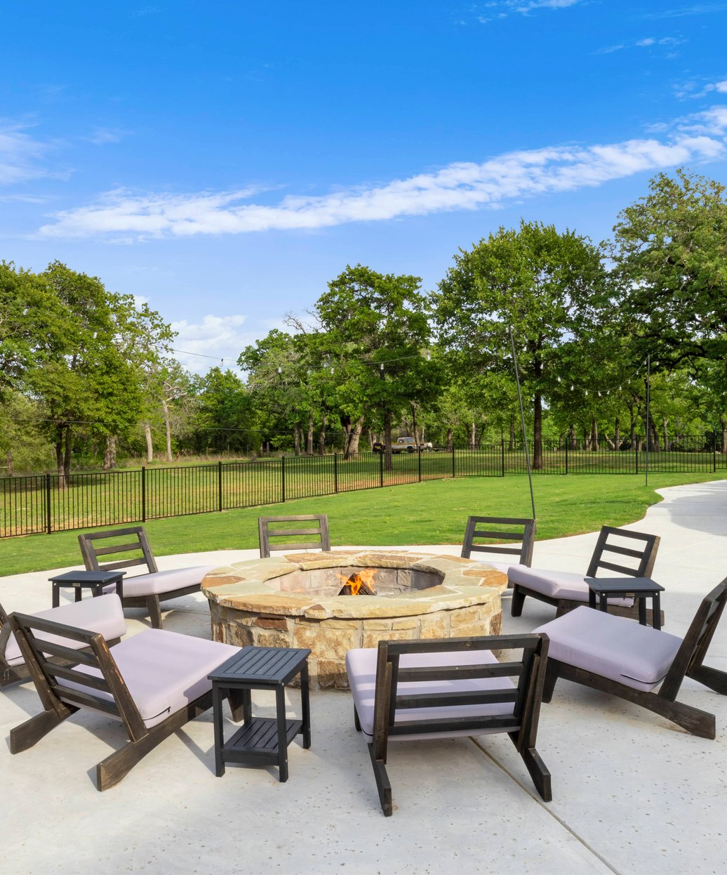 Pool landscaping with pavers and tropical plantings in Frisco, TX